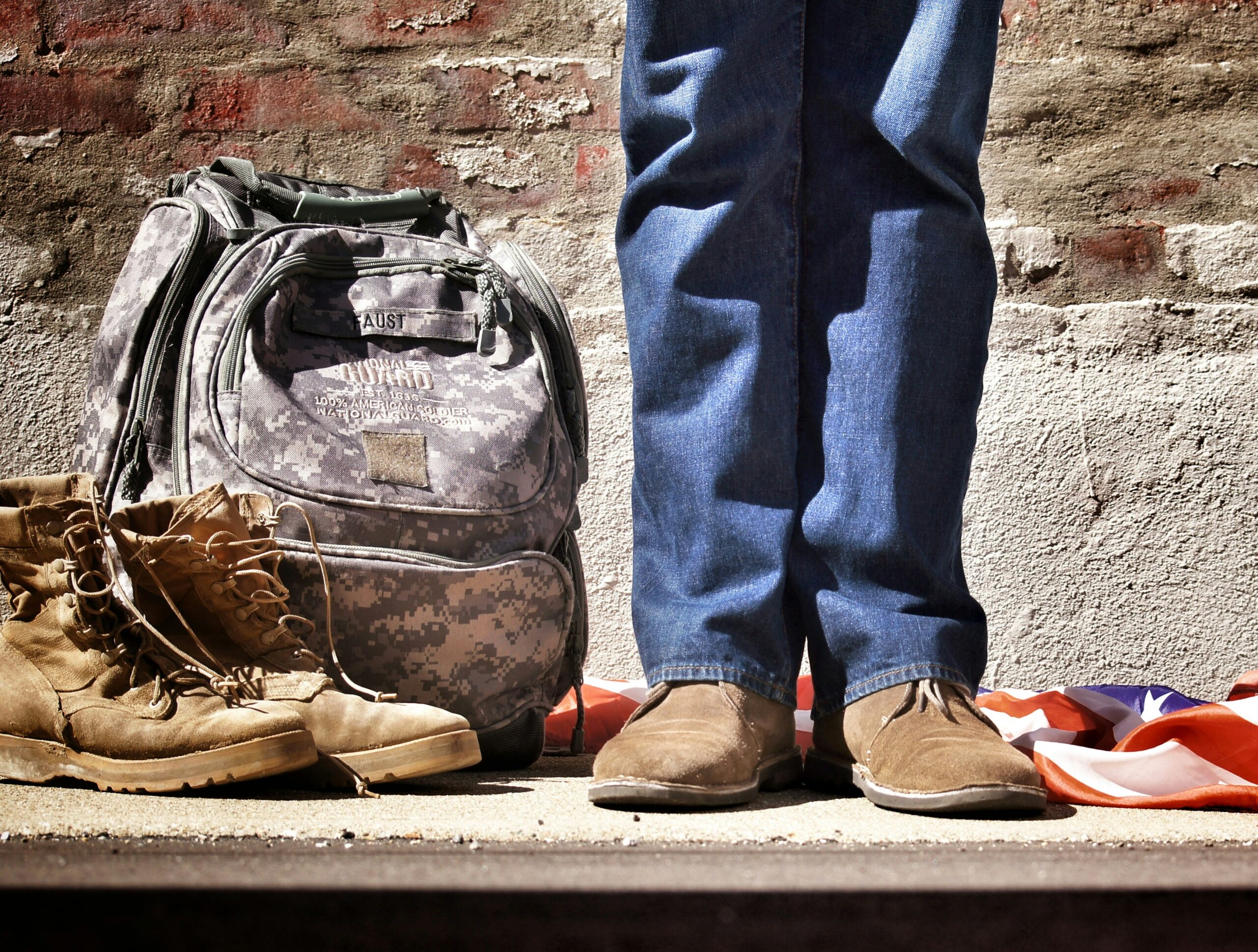 military People Images & Pictures footwear shoe boot veteran People Images & Pictures Flag Images & Pictures national guard leg jeans army America Images & Photos soldier HD Camo Wallpapers backpack legs brick wall shoes object HD Wallpapers