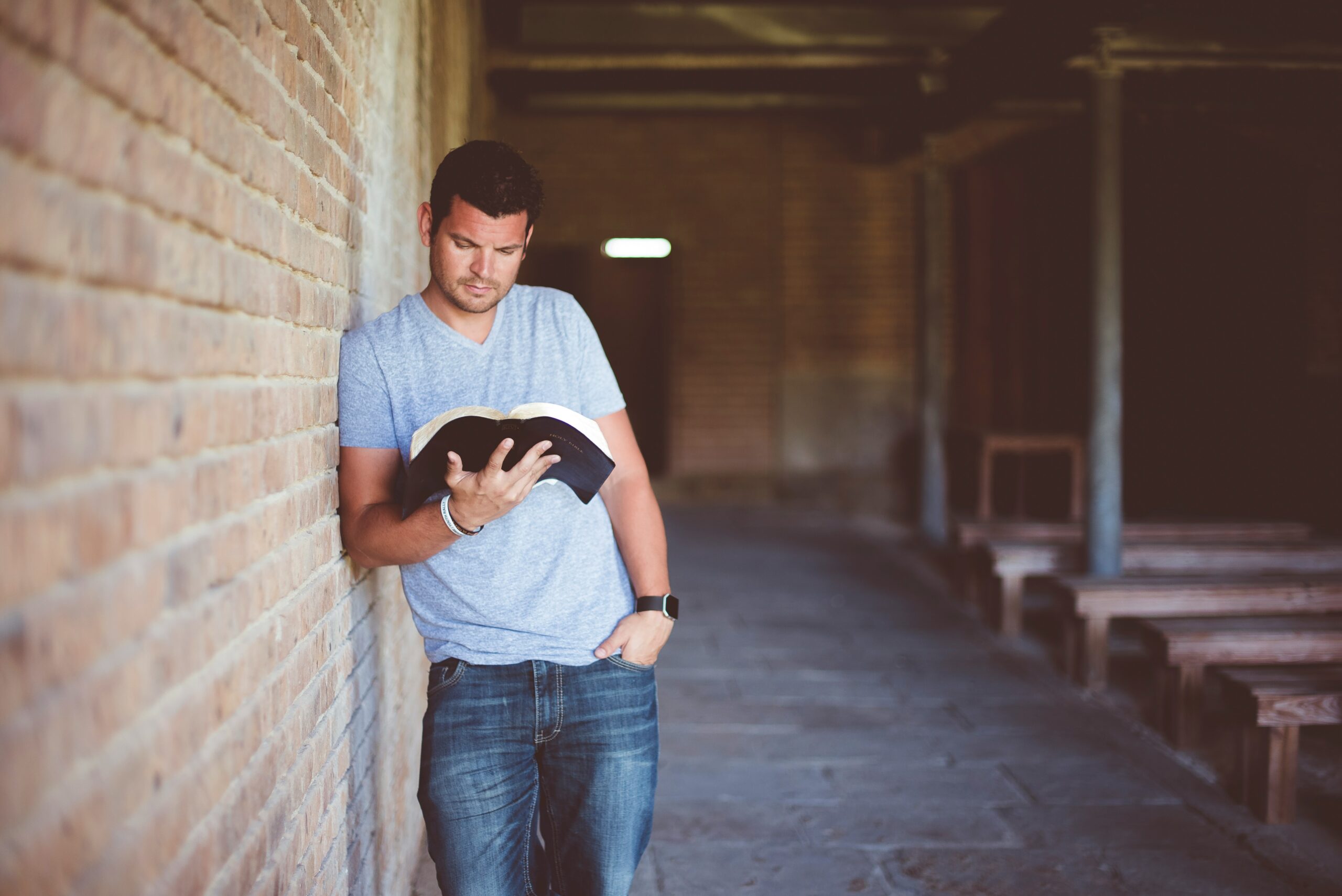 man reading book Man reading outside